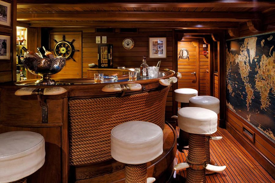 luxury yachts - bar in sailing style with stools and drinks
