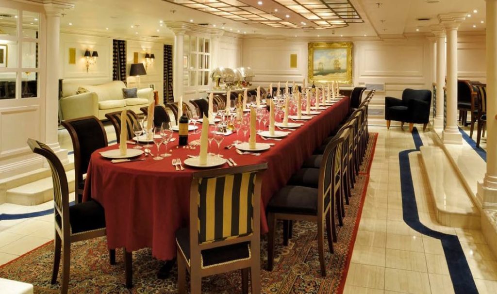 luxury yachts - dining area with large dinner table