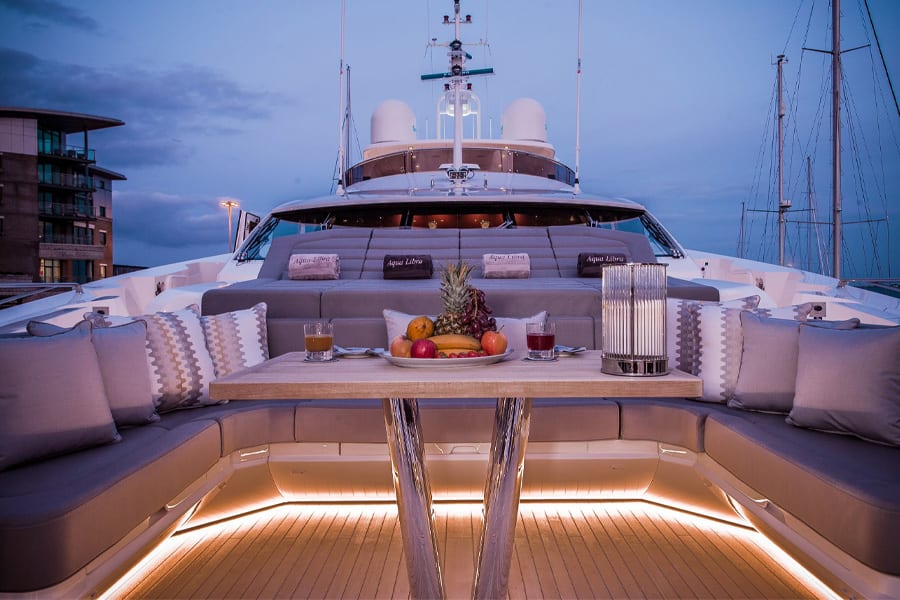luxury yachts - deck of yacht with lounge and ambiance light