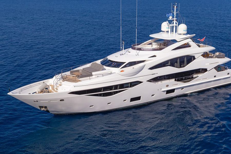 luxury yachts - aerial front side view of yacht on sea