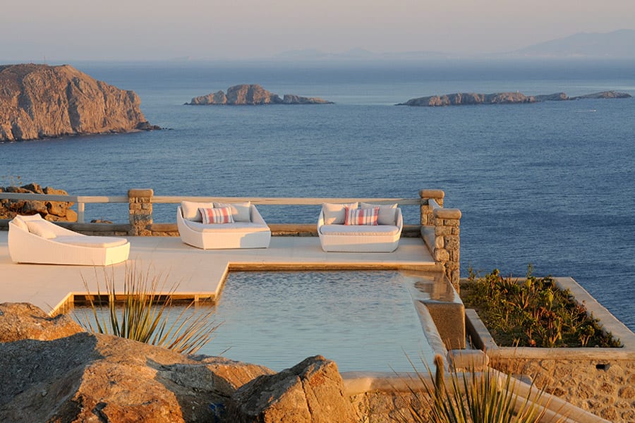 luxury villas - terrace with pool and sea view at sunset