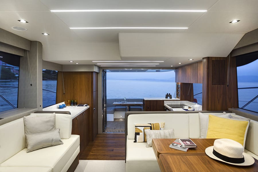 luxury yachts - living room of yacht at dusk