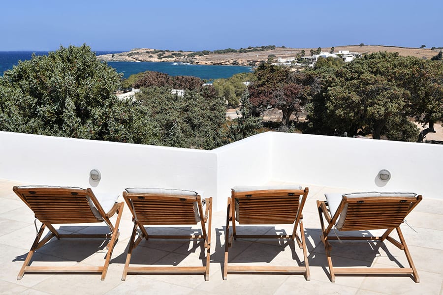 luxury villas - rooftop terrace with chairs