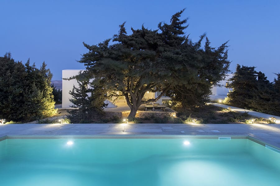 luxury villas - pool with tree by night