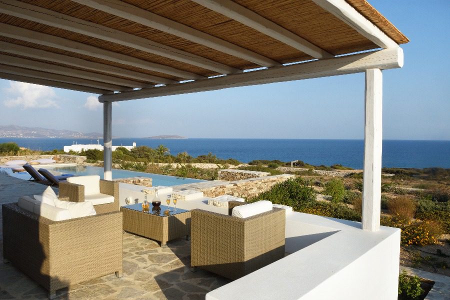 luxury villas - outside relaxing area with pool and sea view