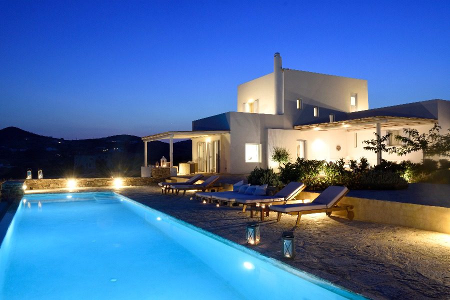 luxury villas - pool by night with villa in the background