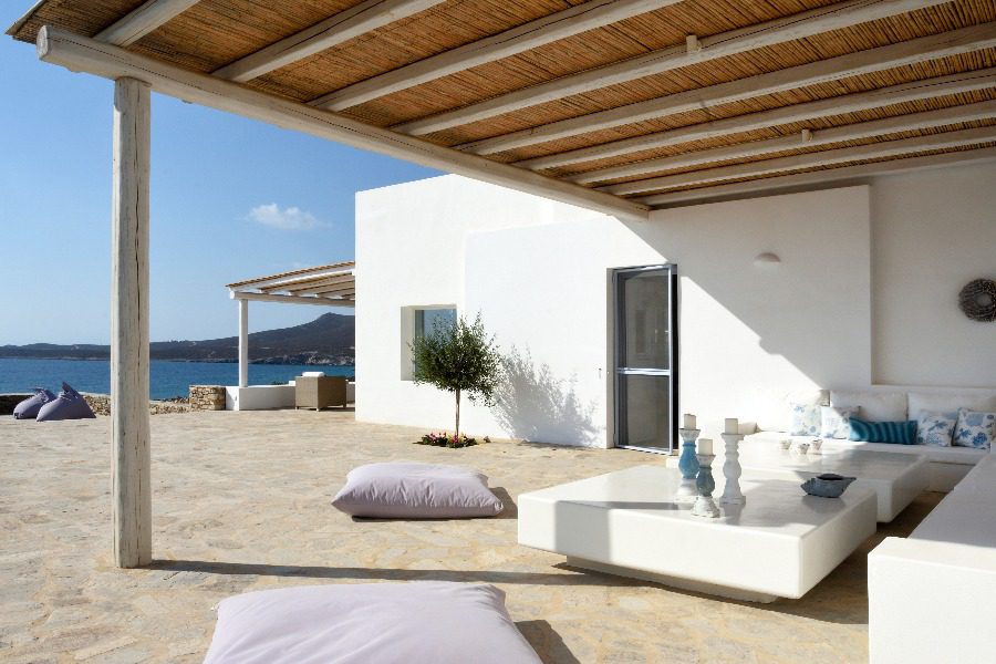 luxury villas - outside relaxing area with sofa and pillows