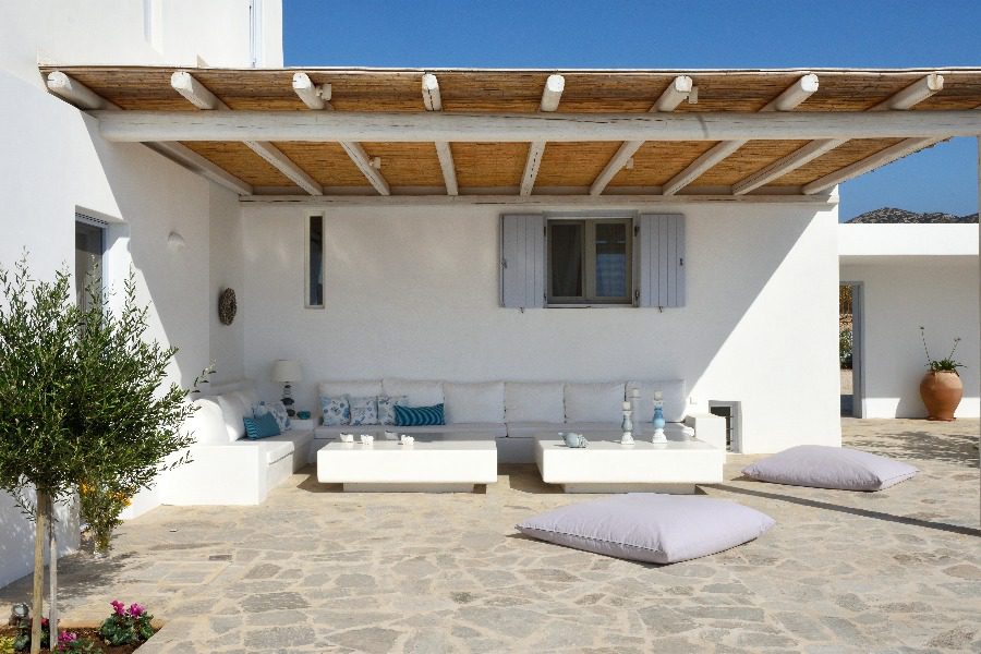 luxury villas - outside relaxing area with sofa and pillows