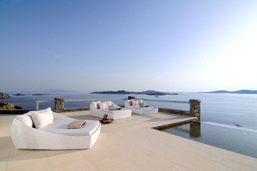 luxury villas - infinity pool with sun beds