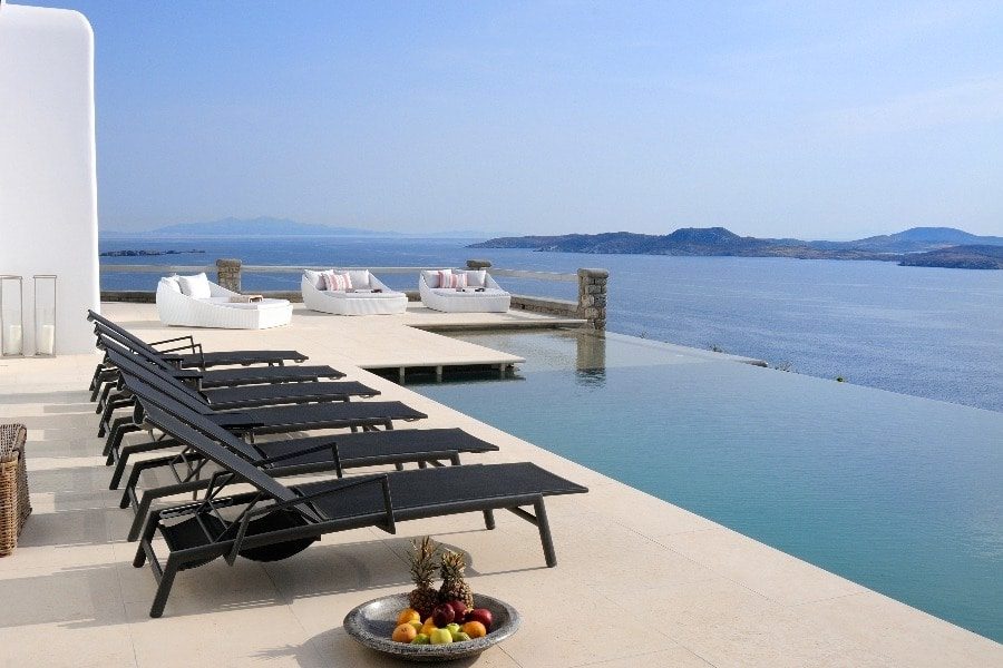 luxury villas - infinity pool with sun beds and sea view