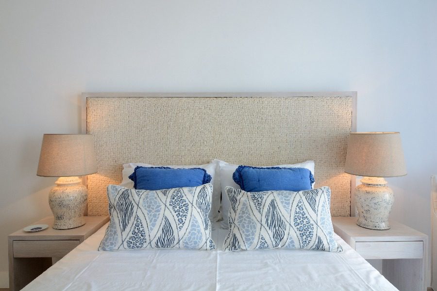 luxury villas - bedroom with double bed and pillows