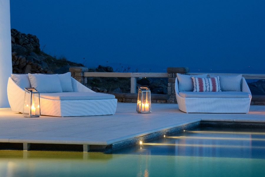 luxury villas - pool with lounge beds by night
