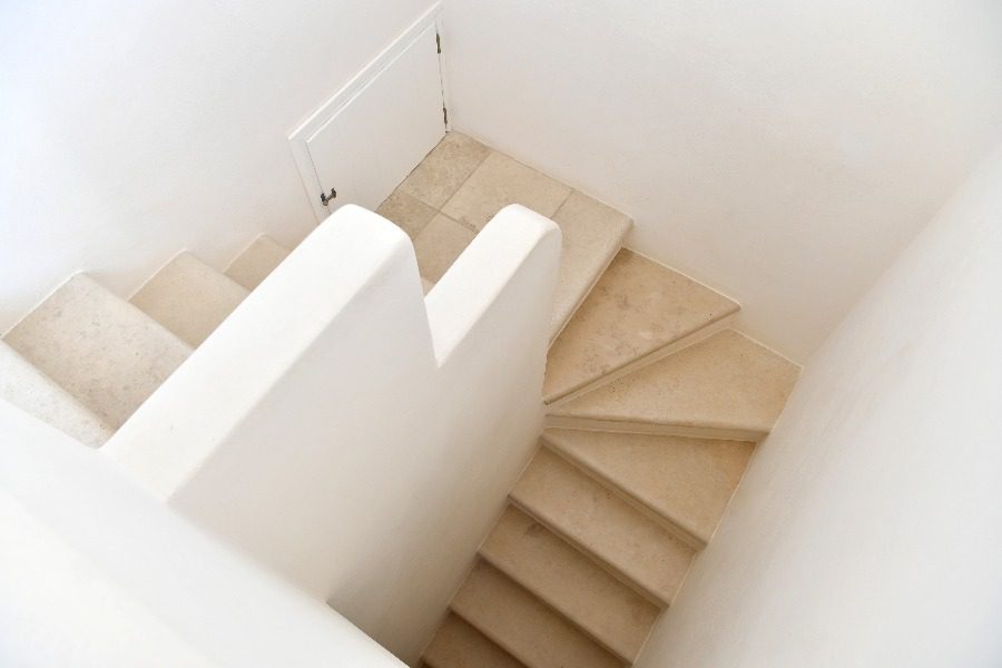 luxury villas - white staircase from above