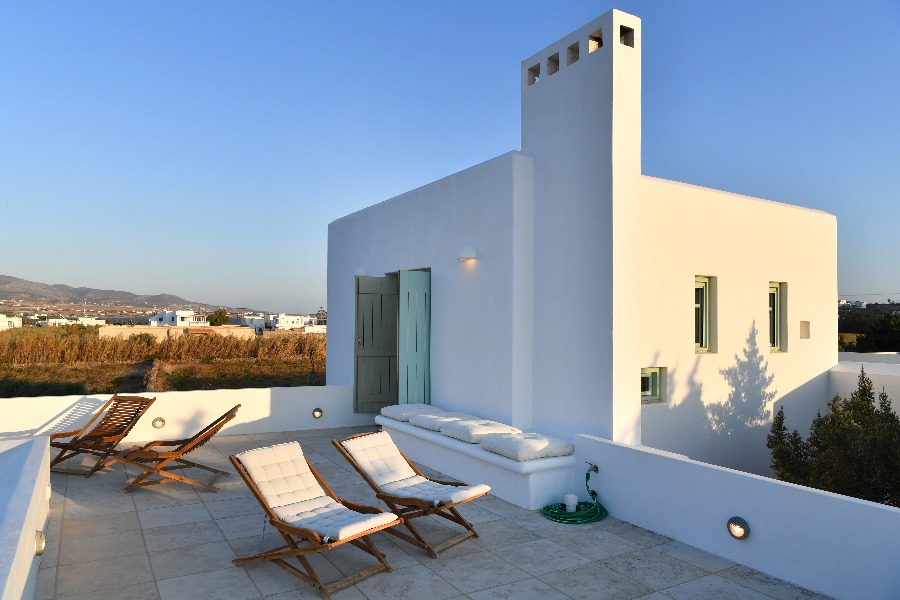 luxury villas - rooftop patio with chairs