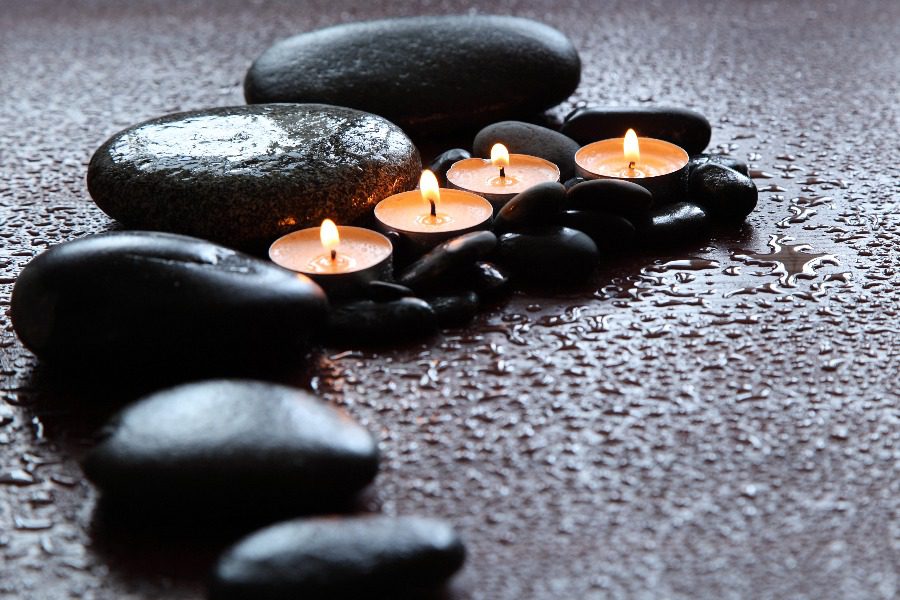 luxury experiences - wellness stones with candles