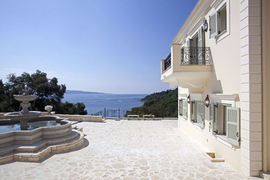 luxury villas - outside of villa with fountain and beautiful sea view