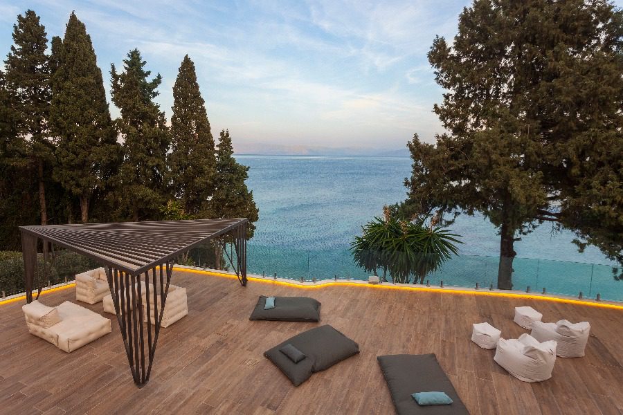 luxury villas - patio from above with relaxing beds at sunset