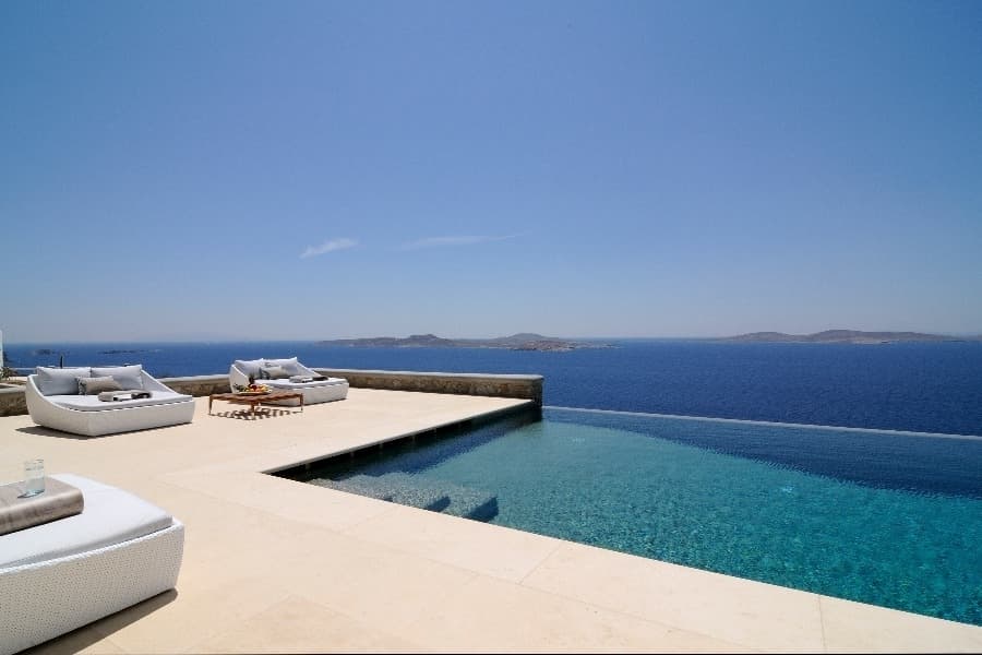 luxury villas - pool with relaxing lounge and sea view
