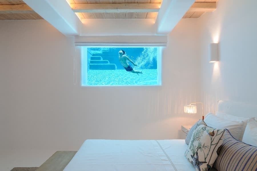 luxury villas - bedroom with window to the pool