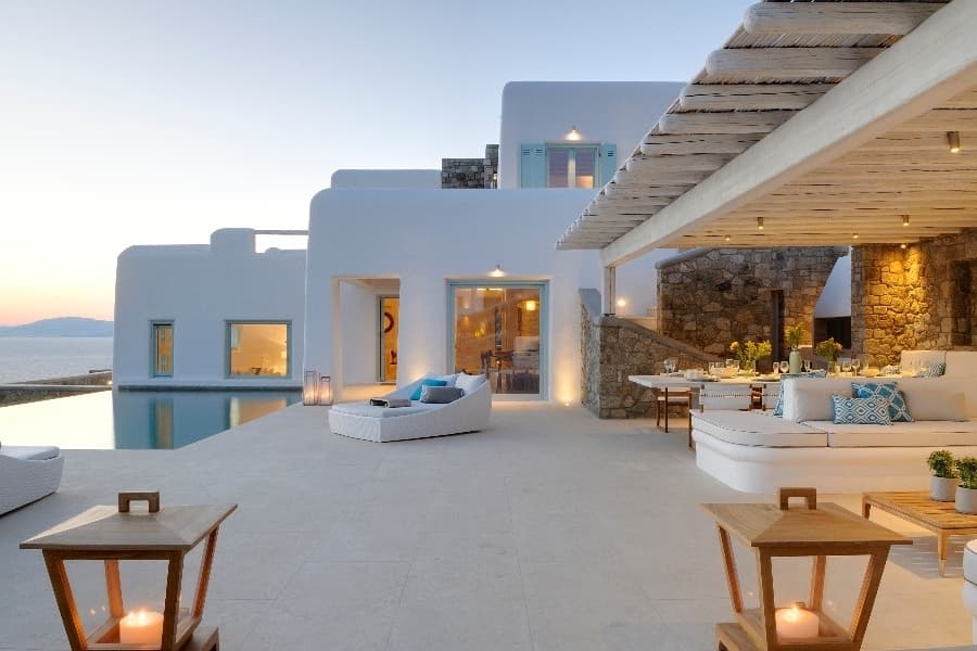 luxury villas - beautiful patio with lounge and pool at sunset