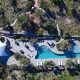 luxury villas - drone shot of villa with large pool