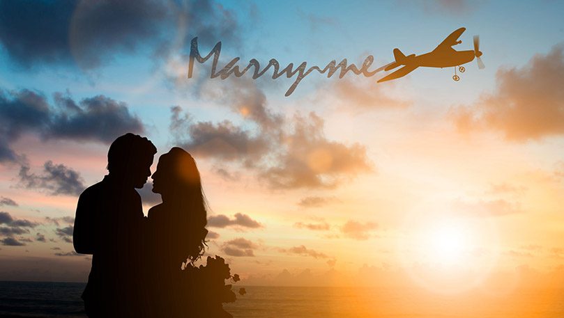 luxury experiences - couple at sunset