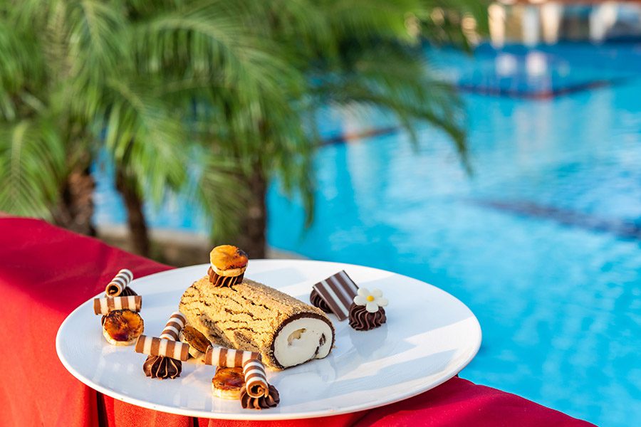 luxury services - cake at the pool