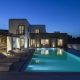 luxury villas - poolside of villa klio at dusk