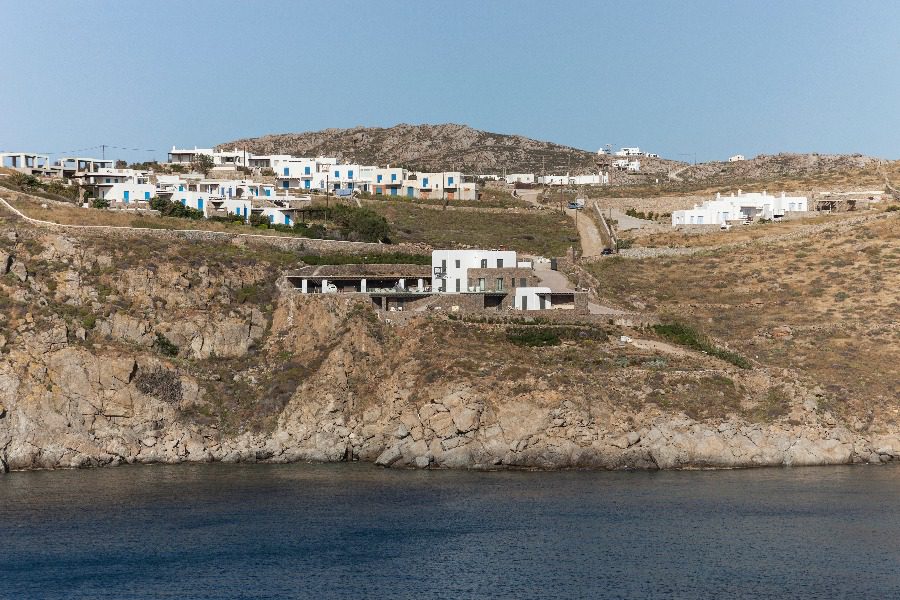 luxury villas - drone shot of villa with sea view