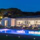 luxury villas - pool with sun beds at night