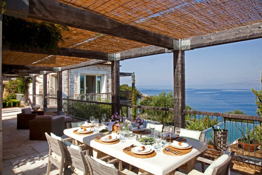luxury villas - outside dining table with sea view