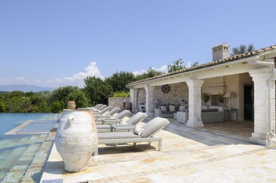 luxury villas - outside sun beds at the pool