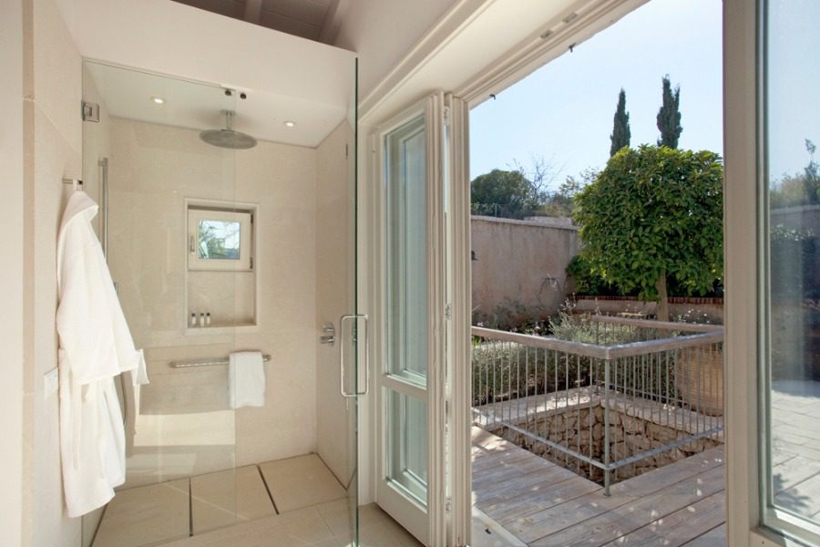 luxury villas - bathroom with shower and open door to terrace