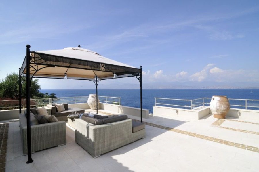 luxury villas - large patio with lounge and sea view