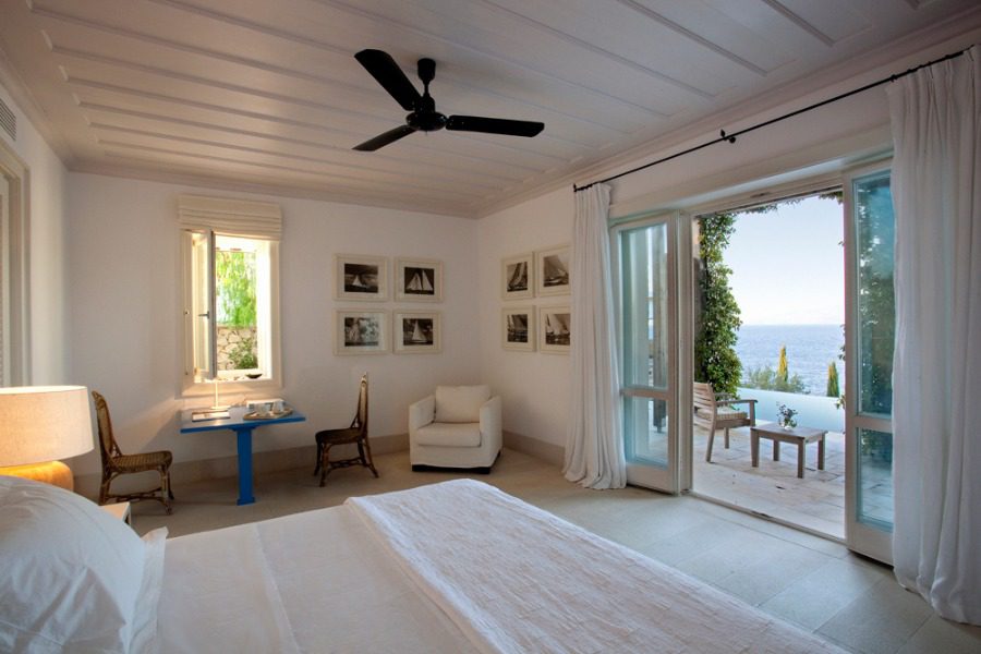 luxury villas - bedroom with double bed and terrace view with beautiful sea view