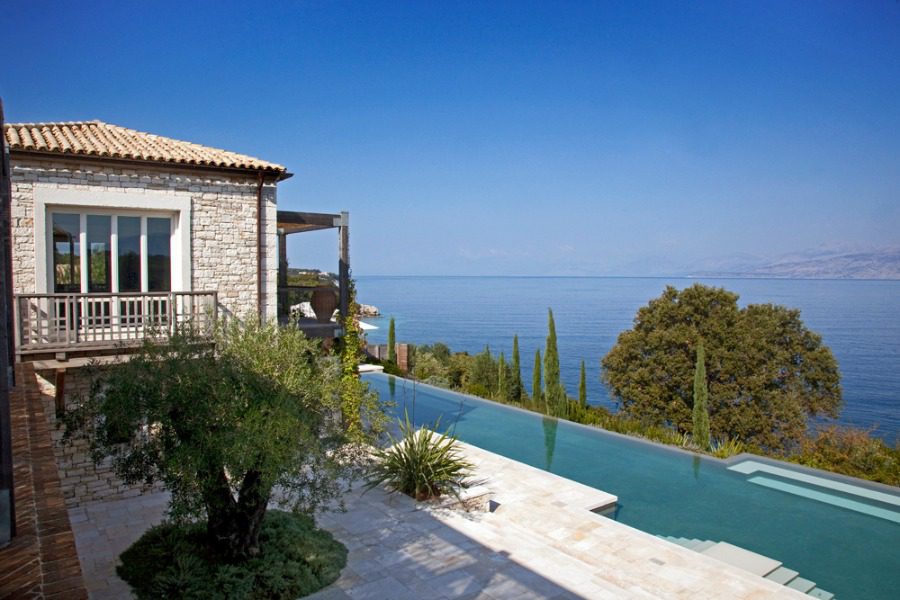 luxury villas - pool with villa and stunning sea view