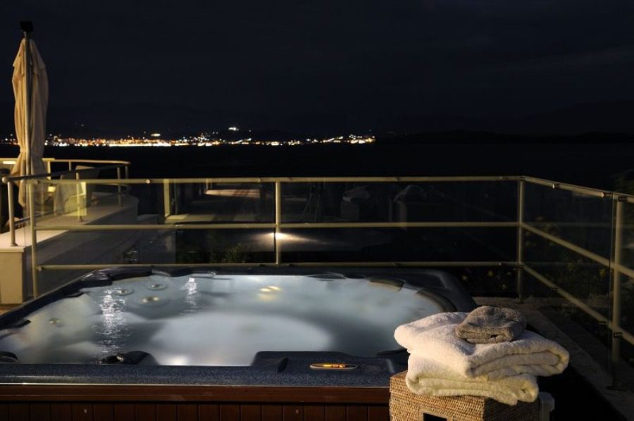 luxury villas - whirlpool with towels by night