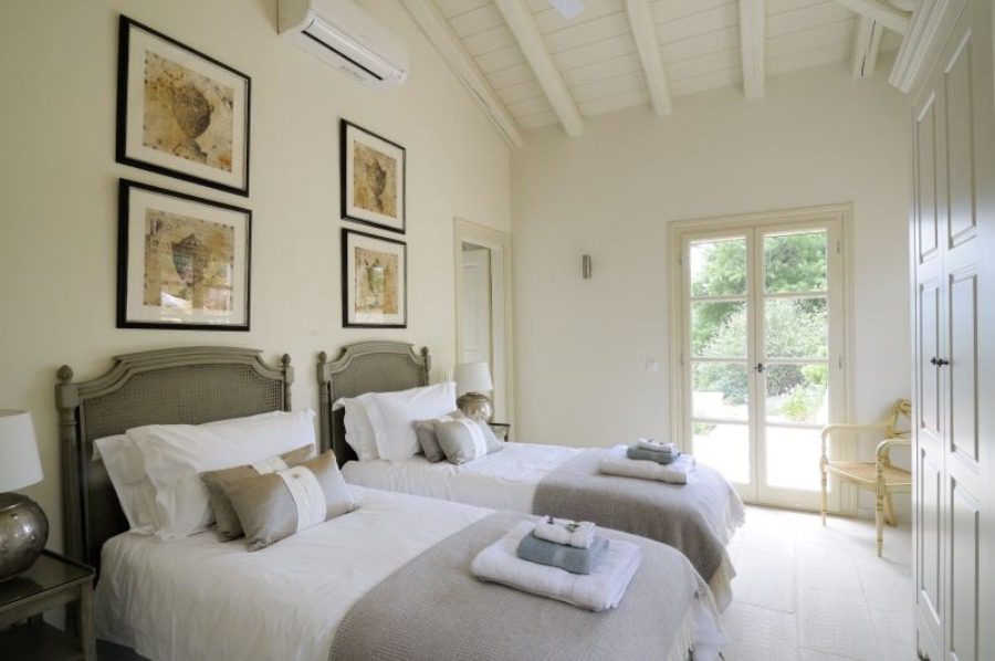 luxury villas bedroom with two single beds