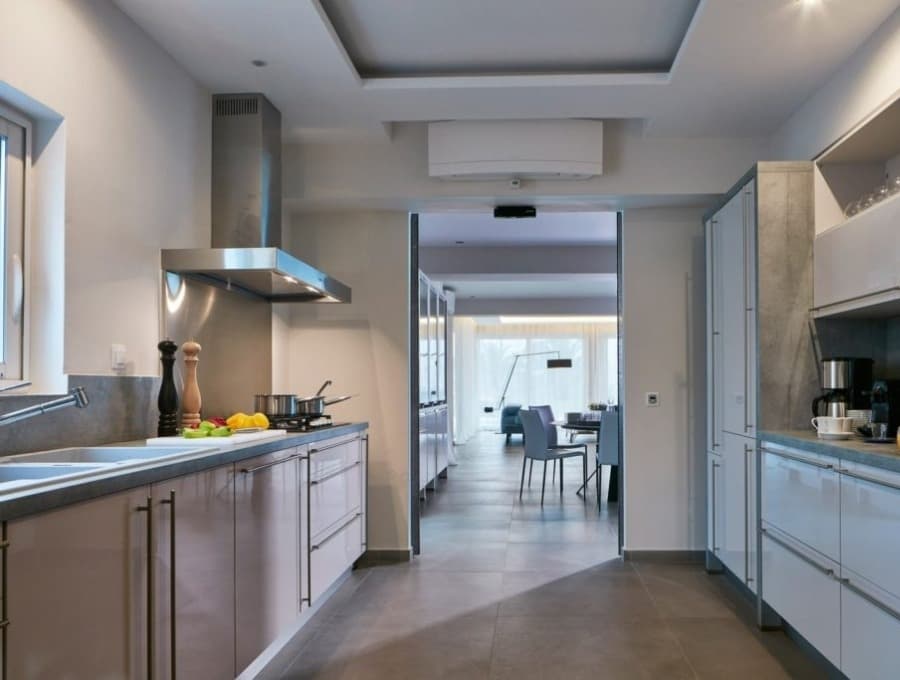 luxury villas - luxurious kitchen with view to the living room