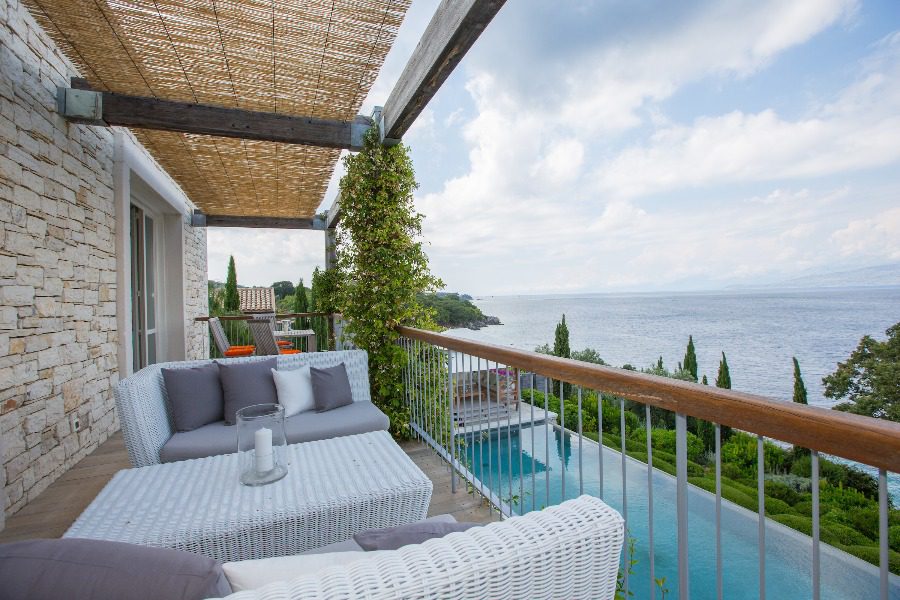 luxury villas - balcony with lounge and pool and sea view