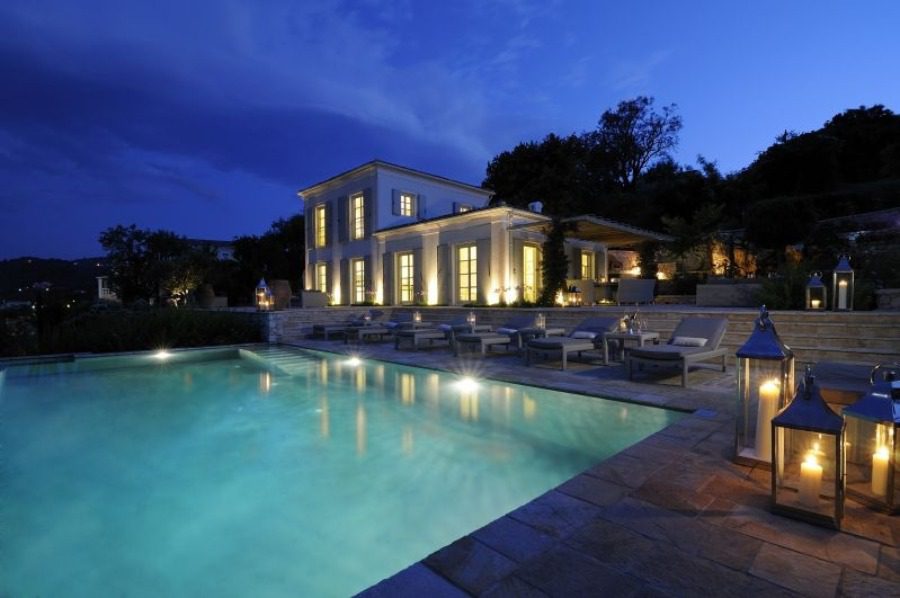 luxury villas - pool with candles by night