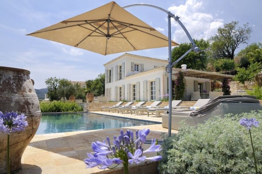 luxury villas - pool with sun bed and umbrella