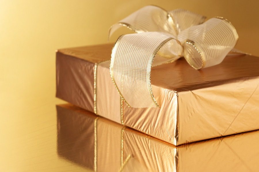 luxury services - gift wrapped in gold