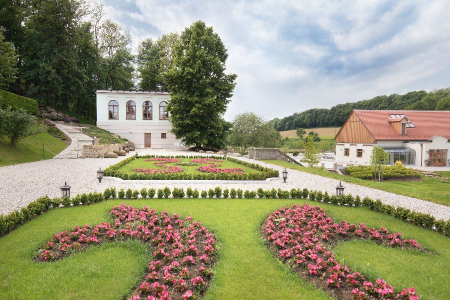 luxury villas - castle garden with flowers and villa