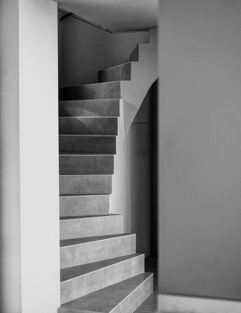 luxury villas - black and white photo of stairs