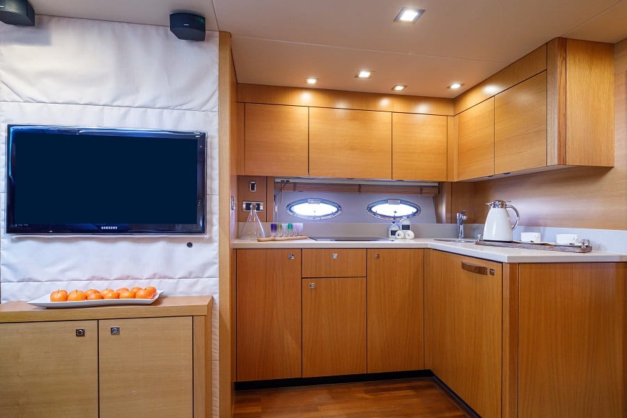 luxury yachts - kitchen area and tv