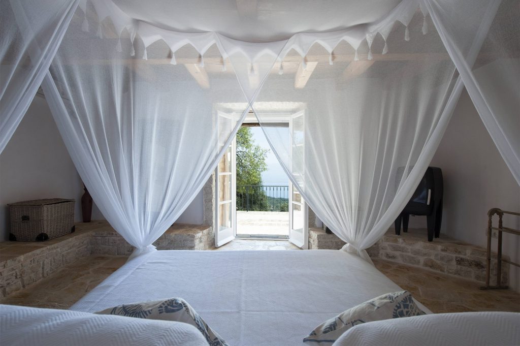 luxury villas - view from canopy bed to the terrace