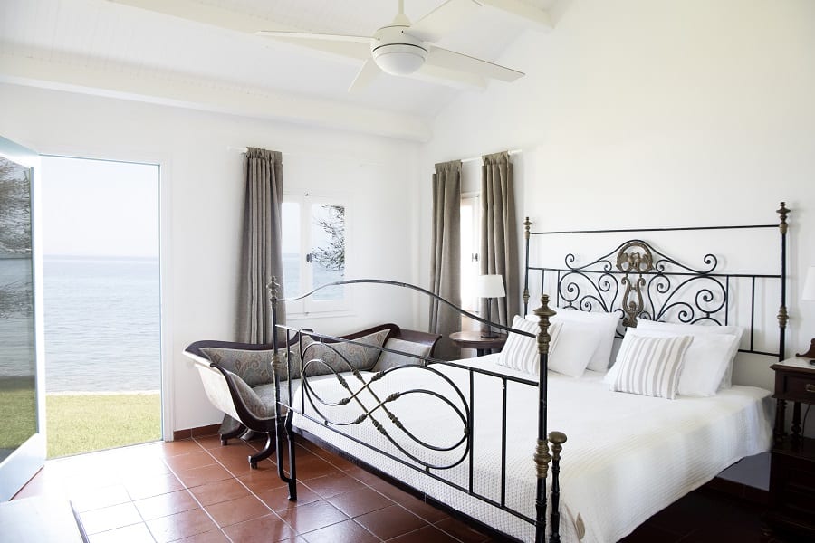 luxury villas - bedroom with large double bed and sea view