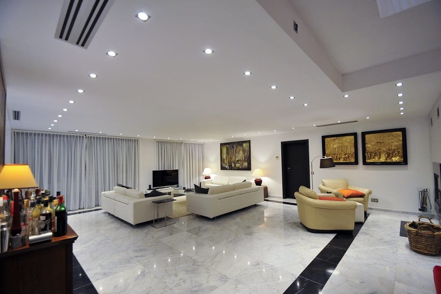 luxury villas - living room with sofas and armchairs