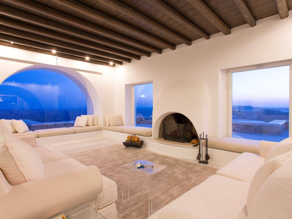 luxury villas - indoor living room with fireplace